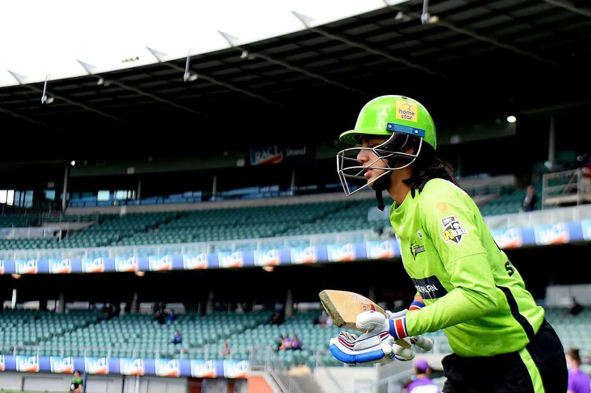 Smriti Mandhana in team uniform preparing for a match
