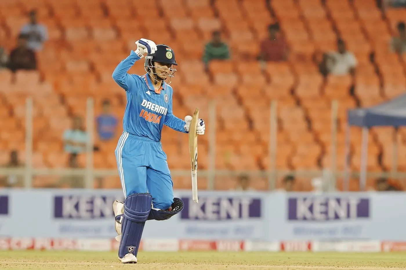 Smriti Mandhana playing a defensive shot in a cricket match