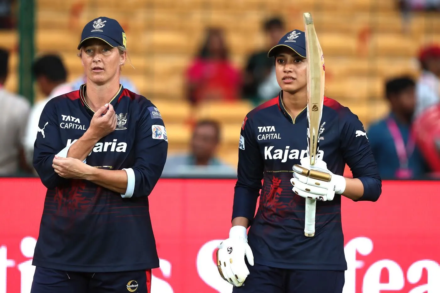 Smriti Mandhana playing a match with her teammates