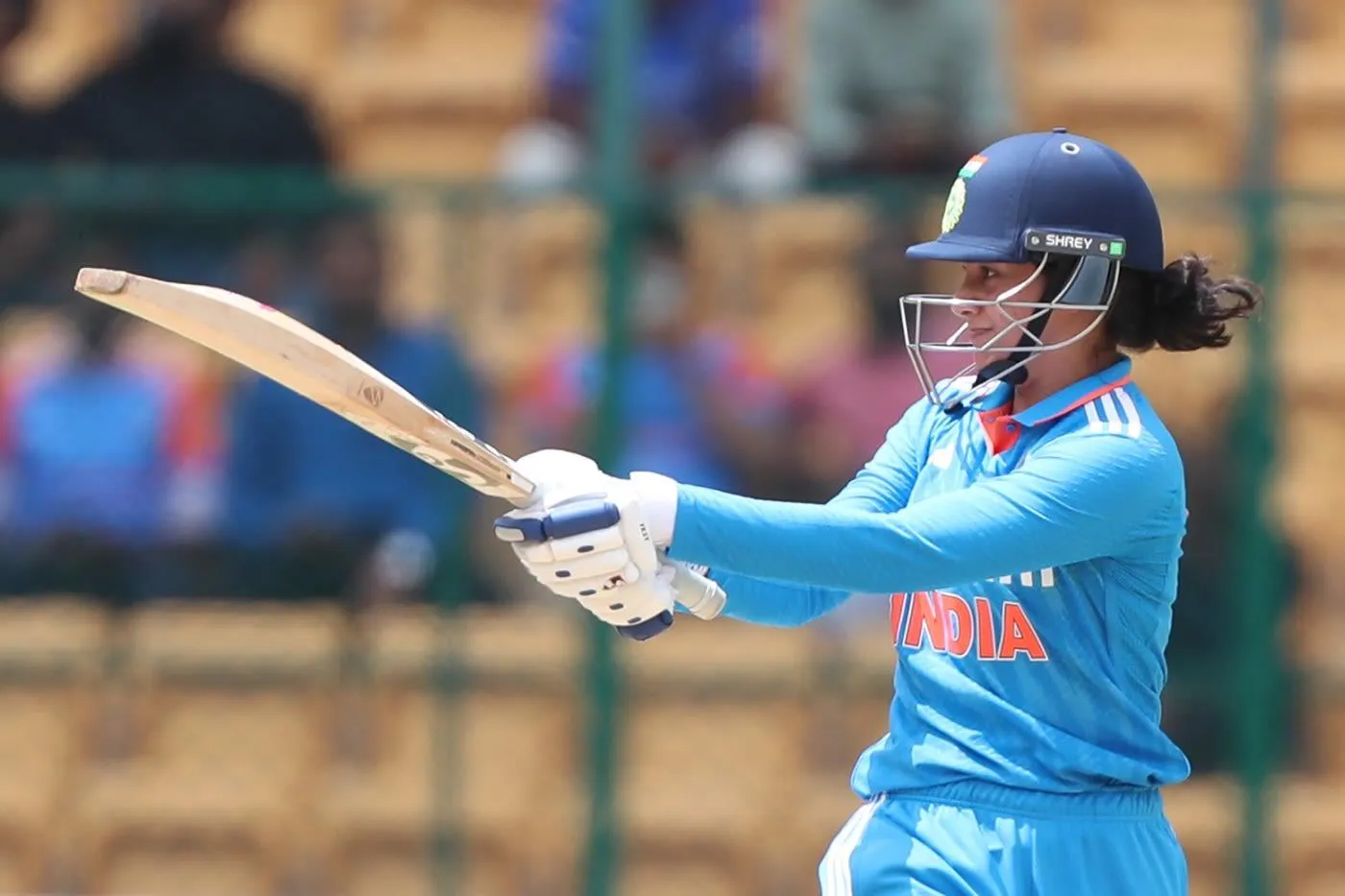 Smriti Mandhana Playing a Shot in Light Blue Jersey