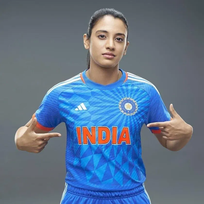 Smriti Mandhana Pointing at Jersey Number with Pride