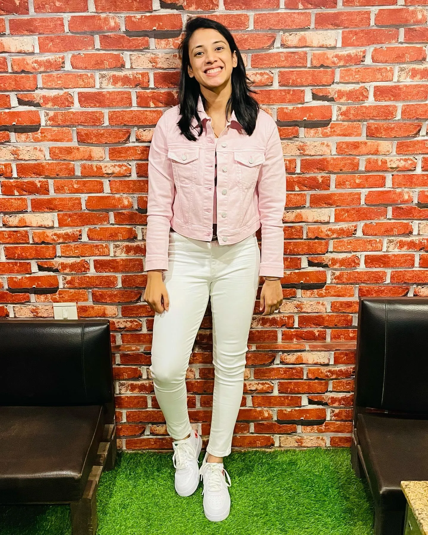 Smriti Mandhana Posing by Brick Wall in Blazer wallpaper