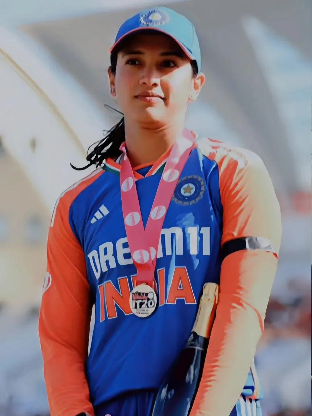 Smriti Mandhana posing confidently in sports attire