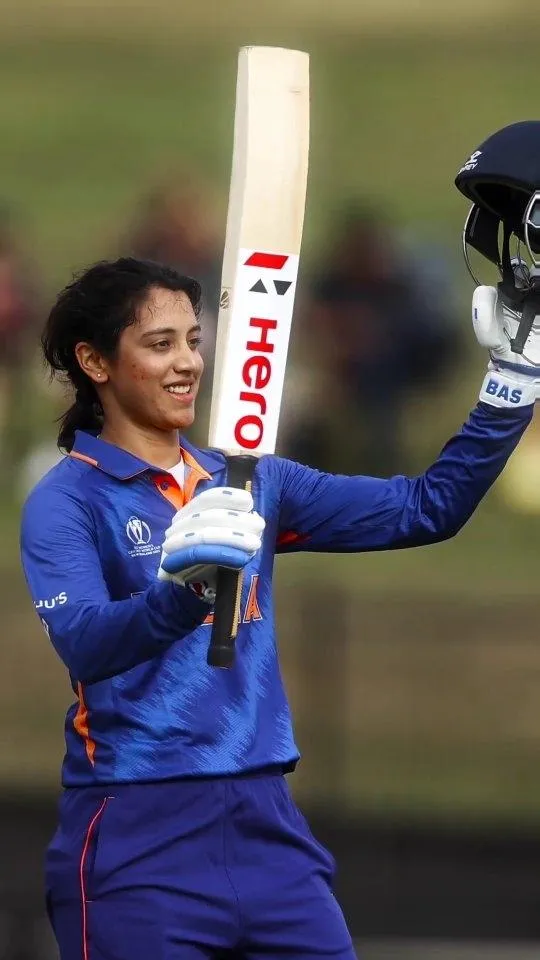 Smriti Mandhana Posing in Blue Jersey on the Field