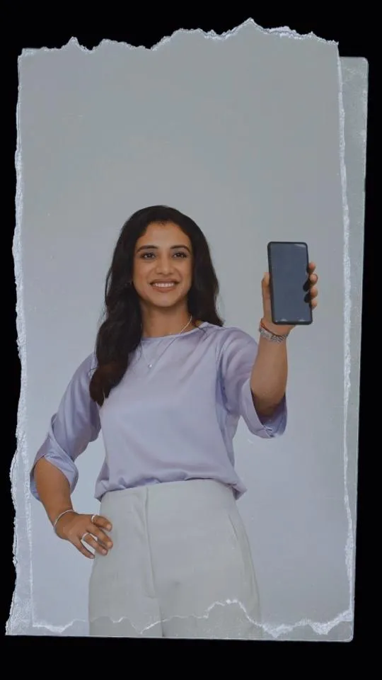 Smriti Mandhana Posing in Casual White Outfit wallpaper