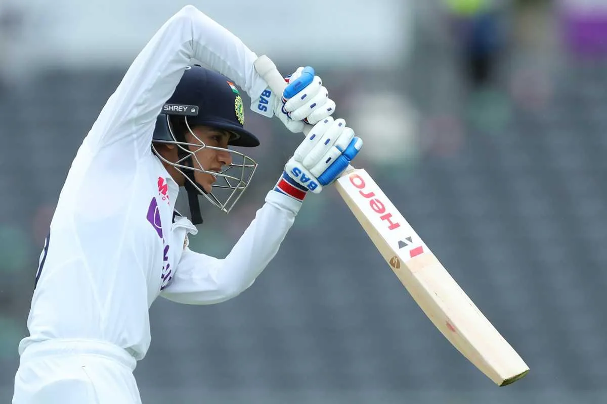 Smriti Mandhana Preparing to Bat in White Cricket Gear
