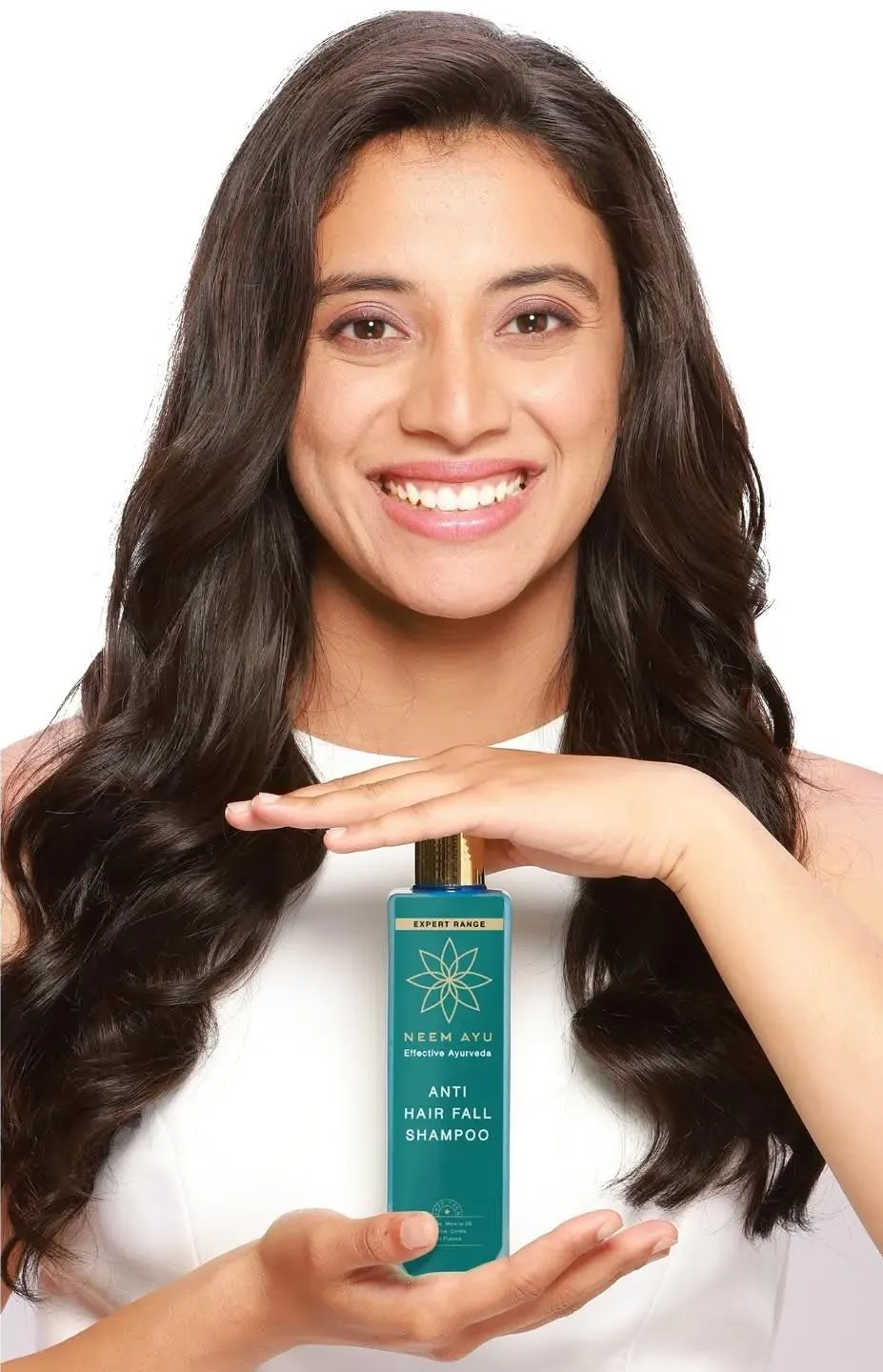Smriti Mandhana promoting a product with a smile wallpaper