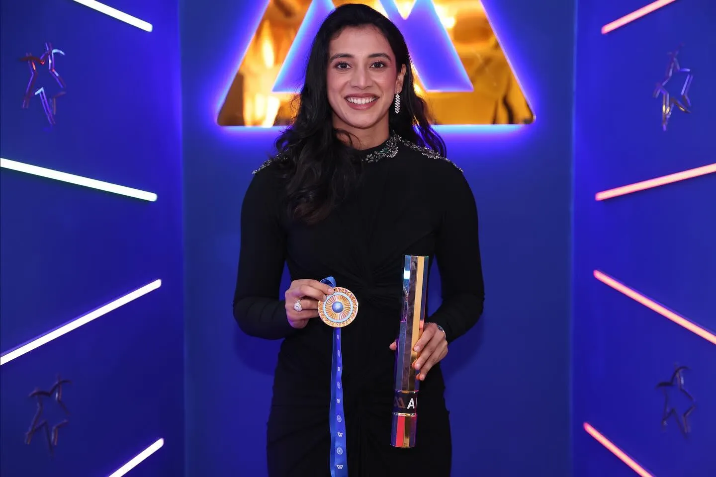 Smriti Mandhana Receiving Award in Blue Stage Event