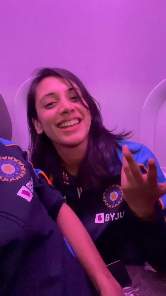 Smriti Mandhana Relaxing with a Smile and Posing wallpaper