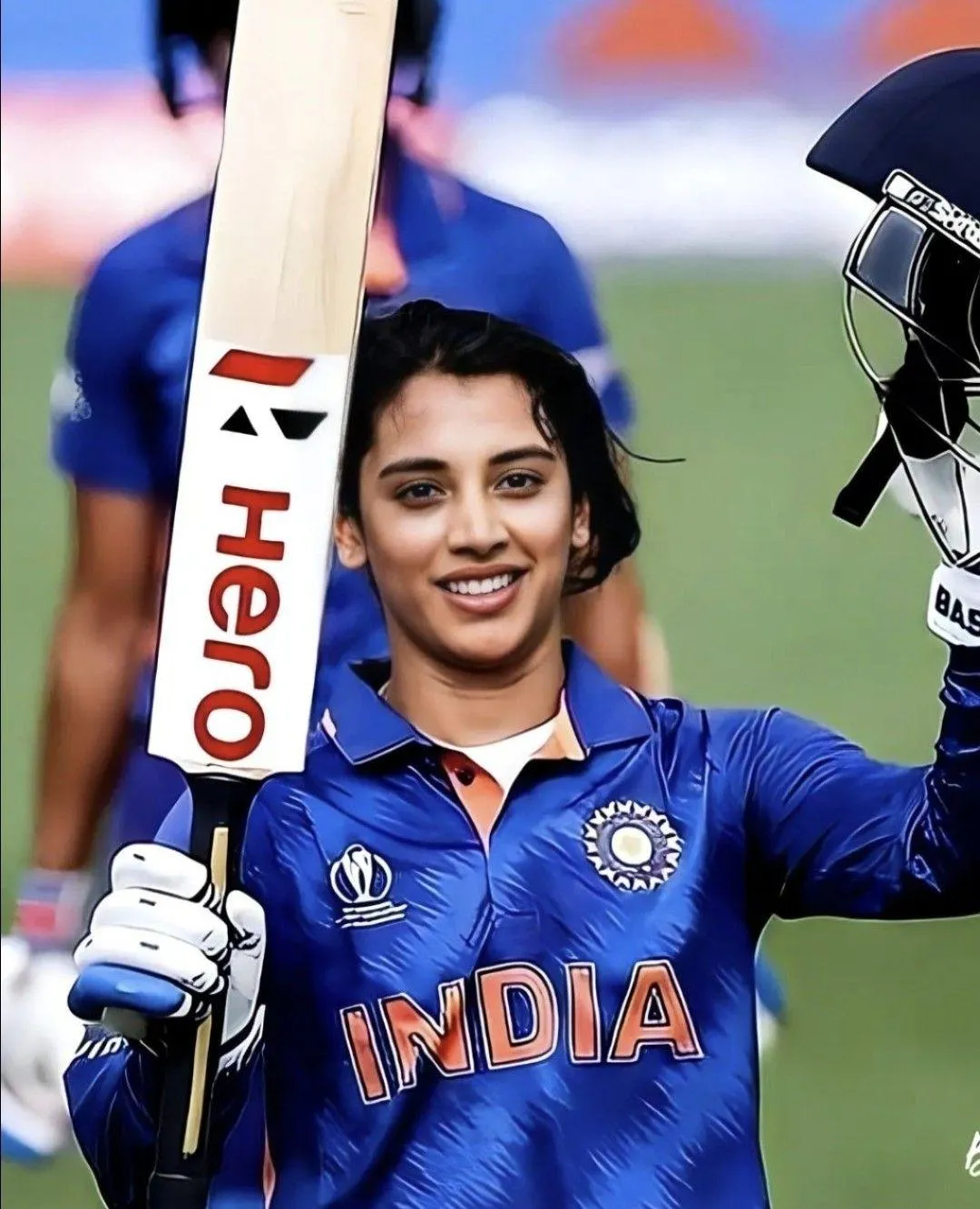 Smriti Mandhana representing India holding her bat
