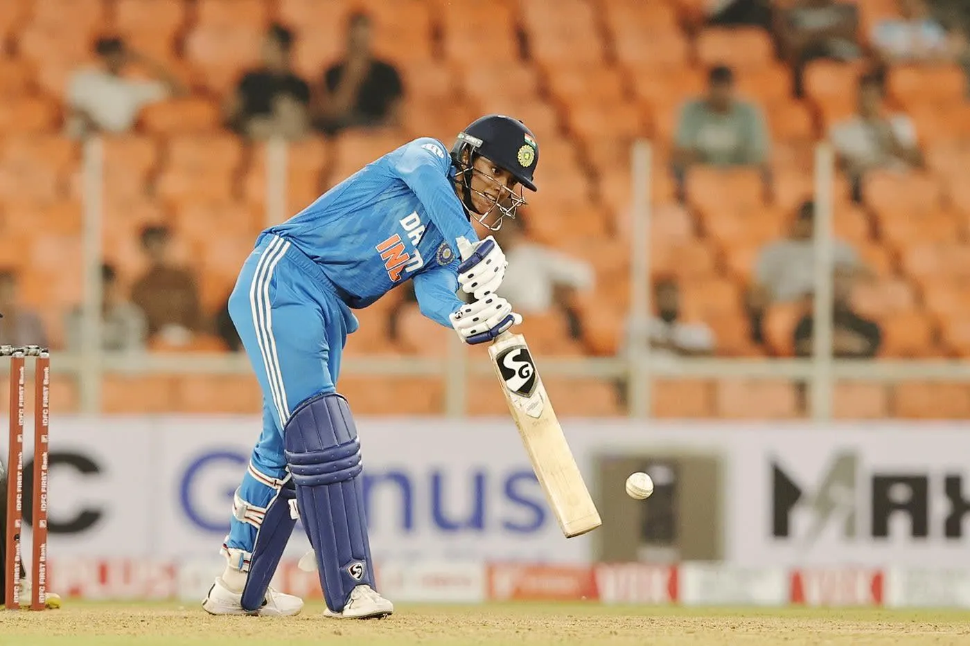 Smriti Mandhana running between wickets during a cricket match