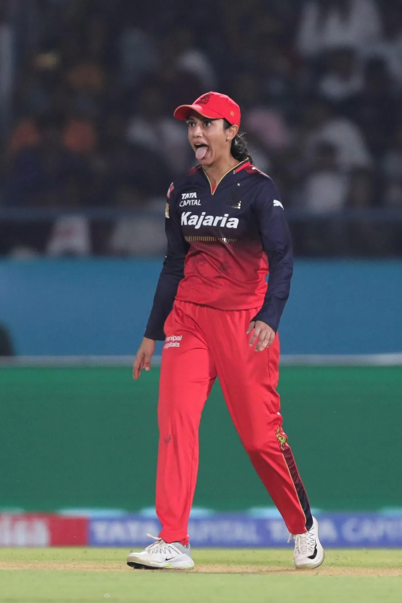 Smriti Mandhana running between wickets during a match