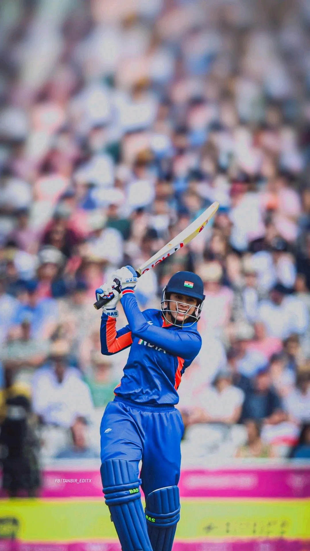 Smriti Mandhana Shines Bright in Blue Cricket Kit wallpaper