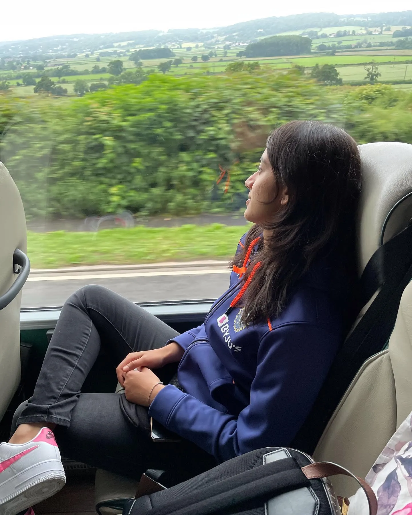 Smriti Mandhana sitting and enjoying nature in a calm setting