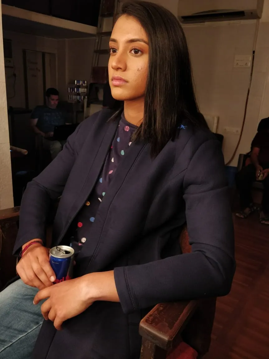 Smriti Mandhana Sitting Confidently in Formal Suit wallpaper