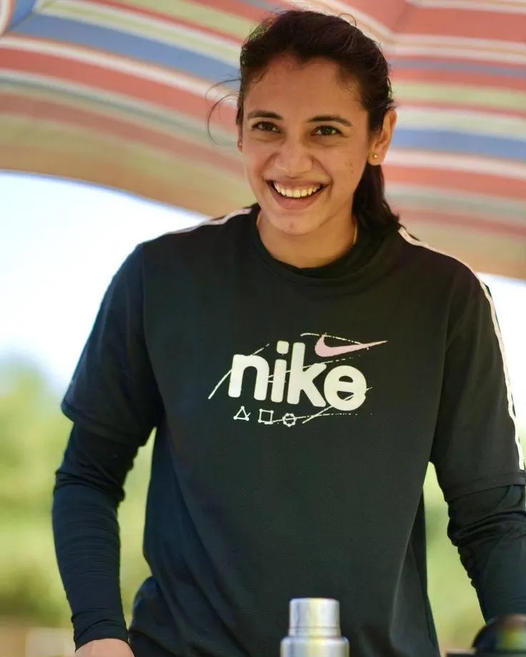 Smriti Mandhana Smiling in Casual Nike Sweater wallpaper