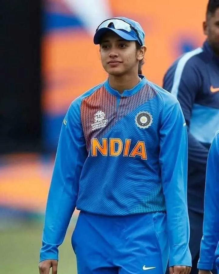 Smriti Mandhana Standing with Indian Team in Blue Kit