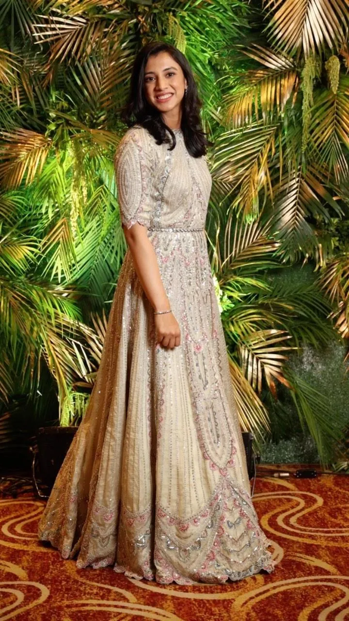Smriti Mandhana Striking a Confident Fashion Pose wallpaper