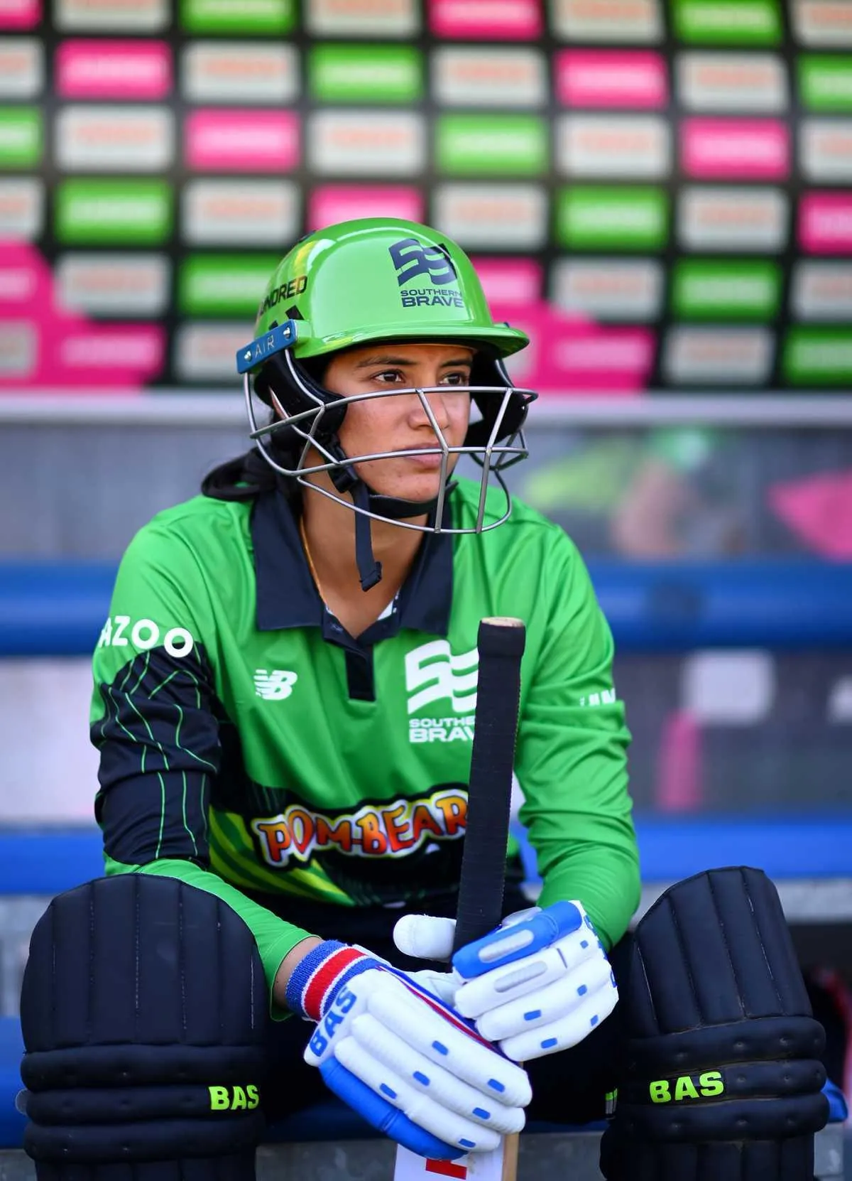 Smriti Mandhana supporting her team during a match