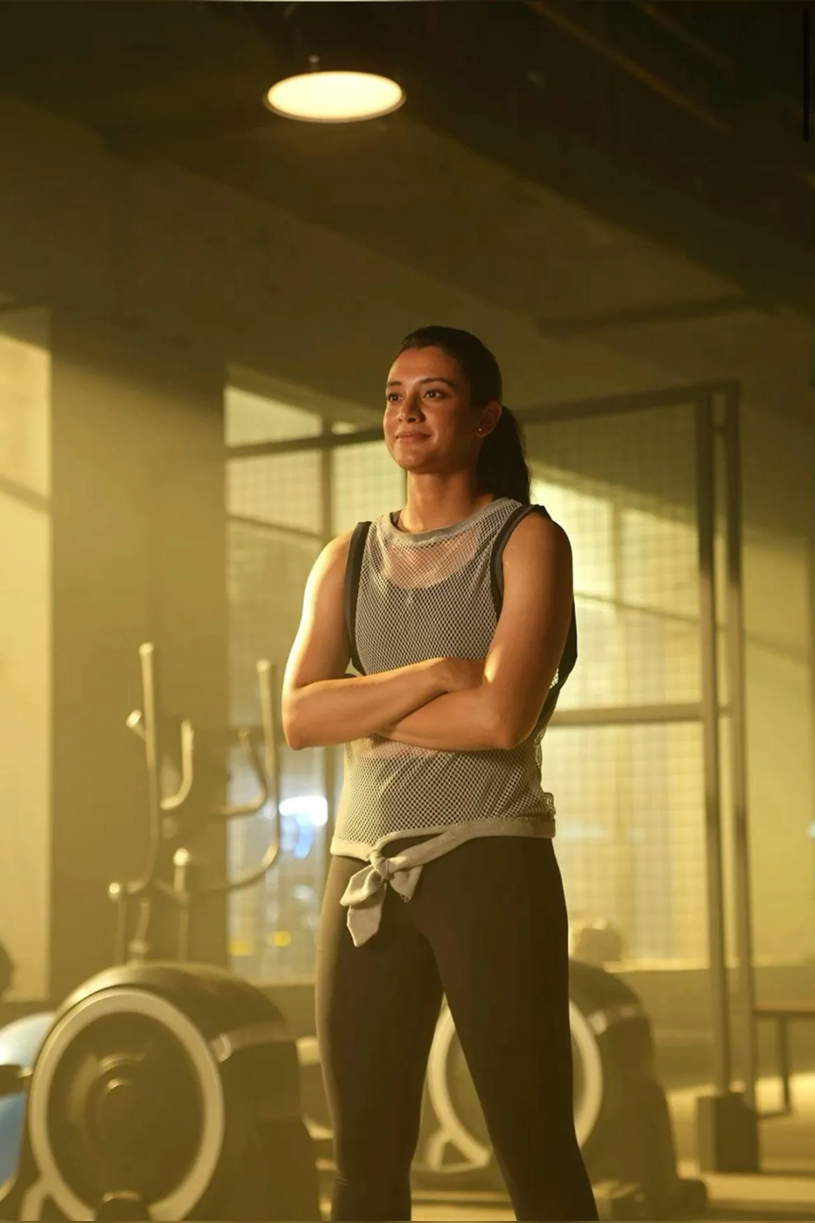 Smriti Mandhana taking a break during a workout session