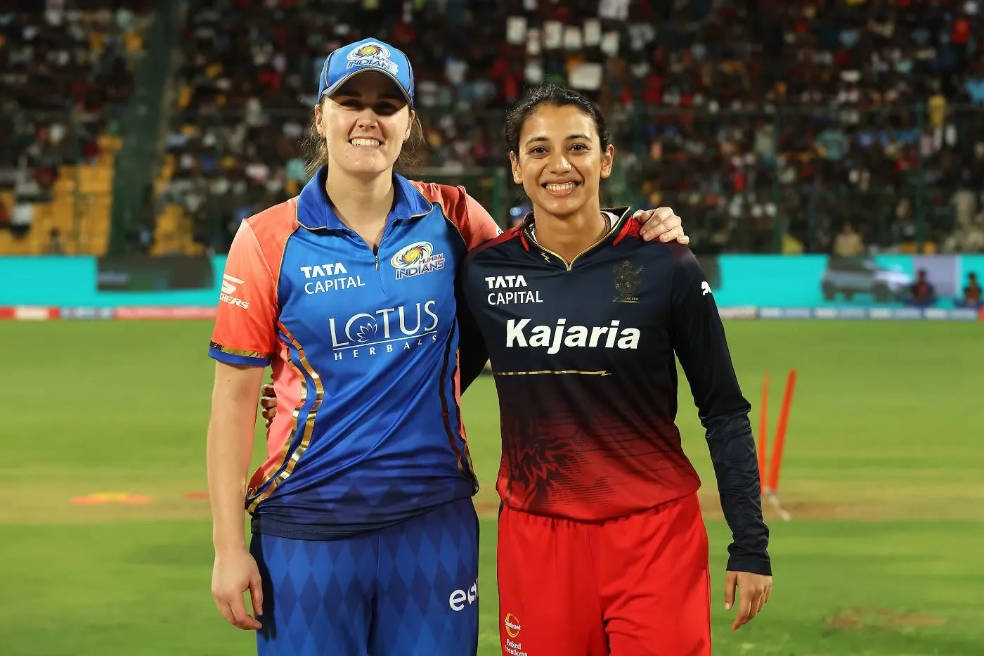 Smriti Mandhana teammates engaged in a pre match discussion