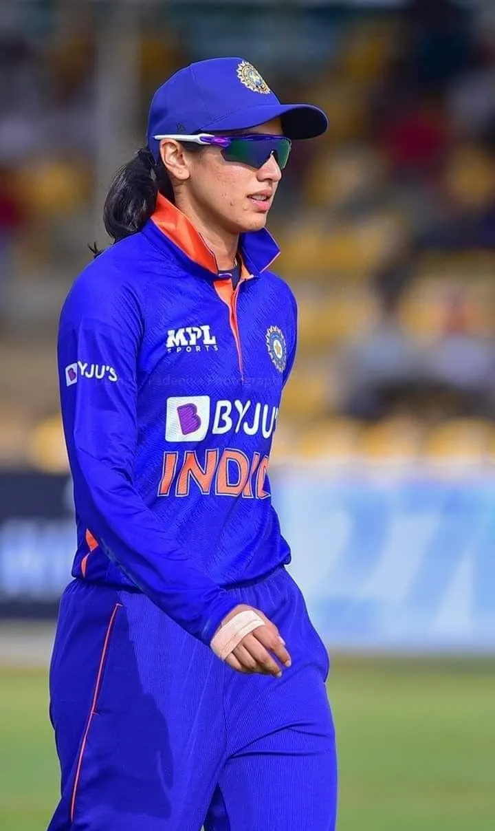 Smriti Mandhana walking off the field during night match