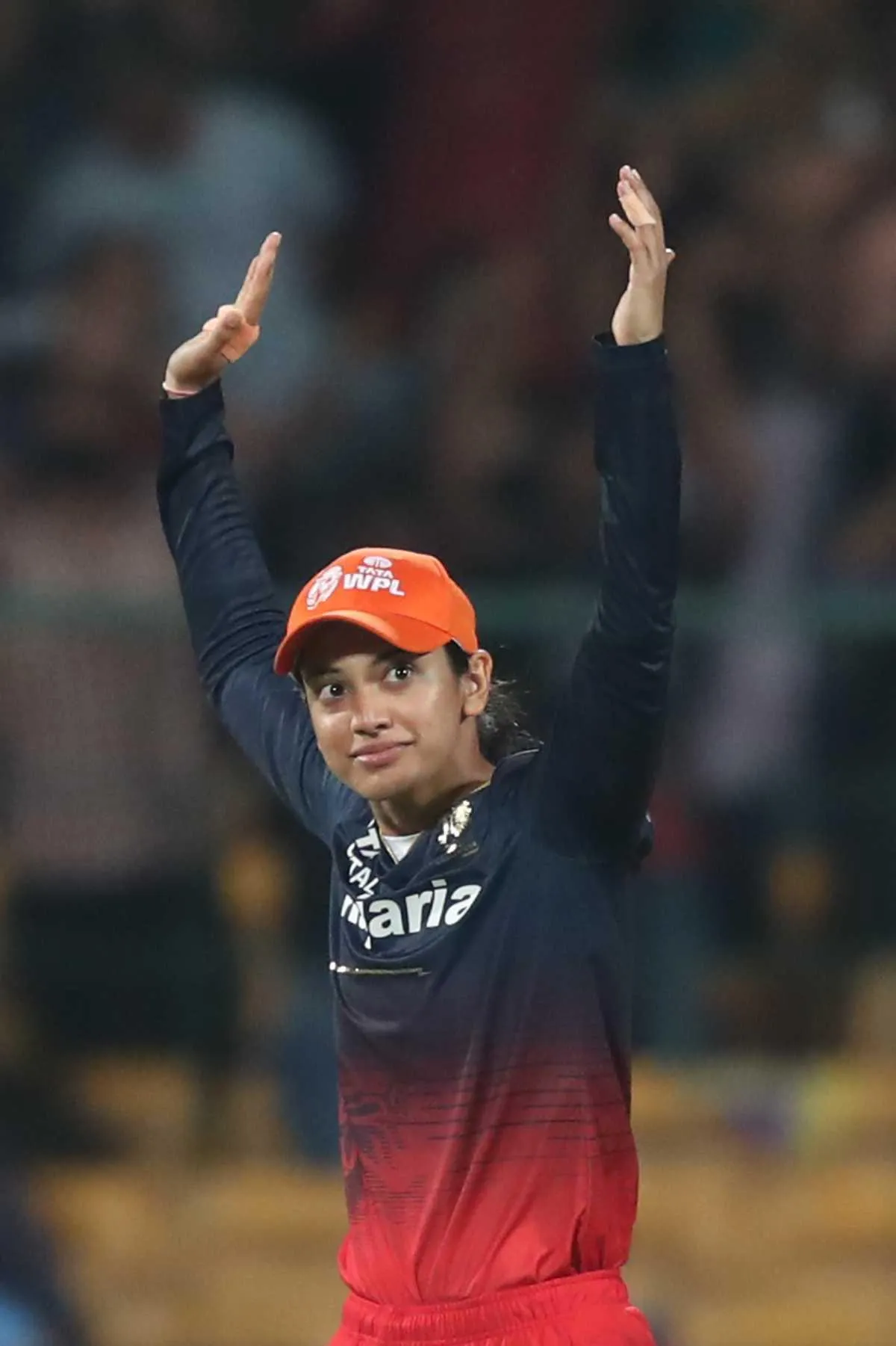 Smriti Mandhana Walking Out Wearing Orange Jersey wallpaper