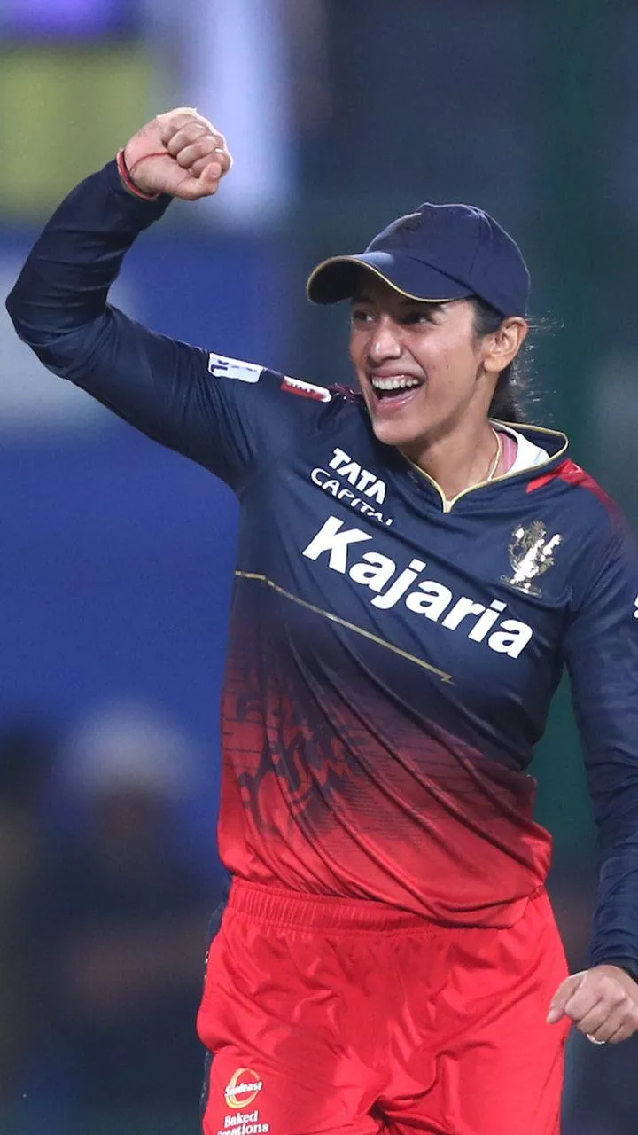 Smriti Mandhana Waving Hand After Match in Red Kit