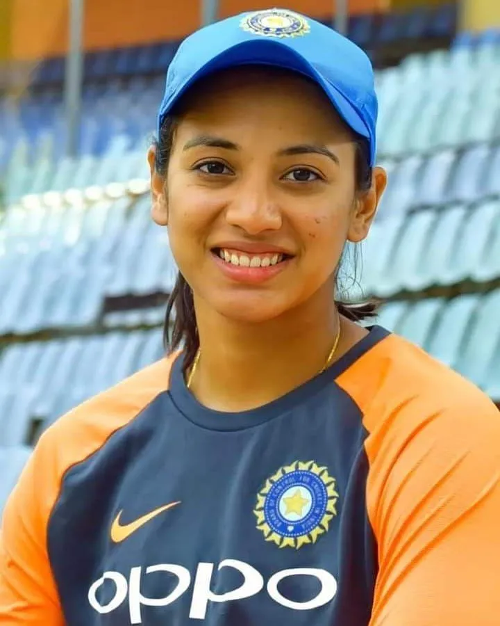 Smriti Mandhana Wearing Orange Training Jersey at Stadium