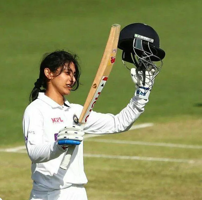 Smriti Mandhana Wearing White Cricket Jersey wallpaper