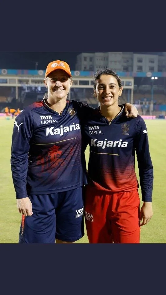 Smriti Mandhana with Teammate Posing After a Match