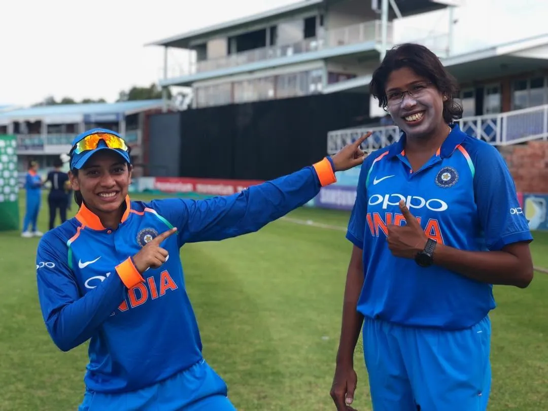 Smriti Mandhana with teammates celebrating victory