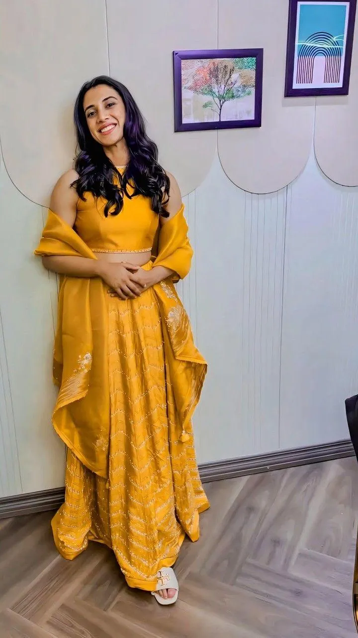Smriti Posing Elegantly in Yellow Traditional Dress