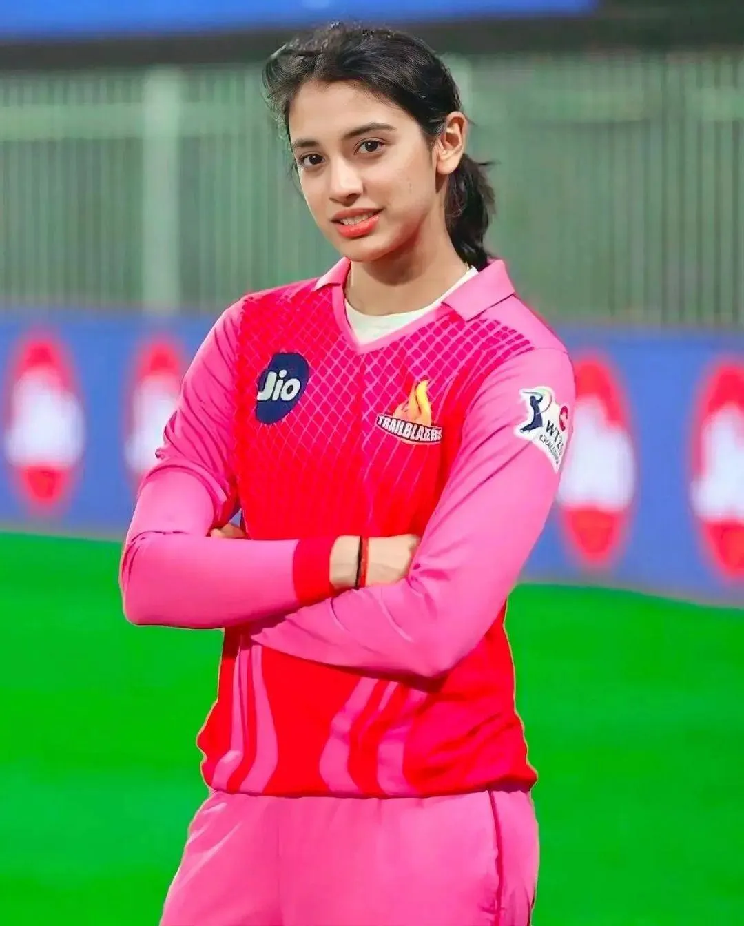 Smriti Standing Proudly in Bright Pink Sports Jersey
