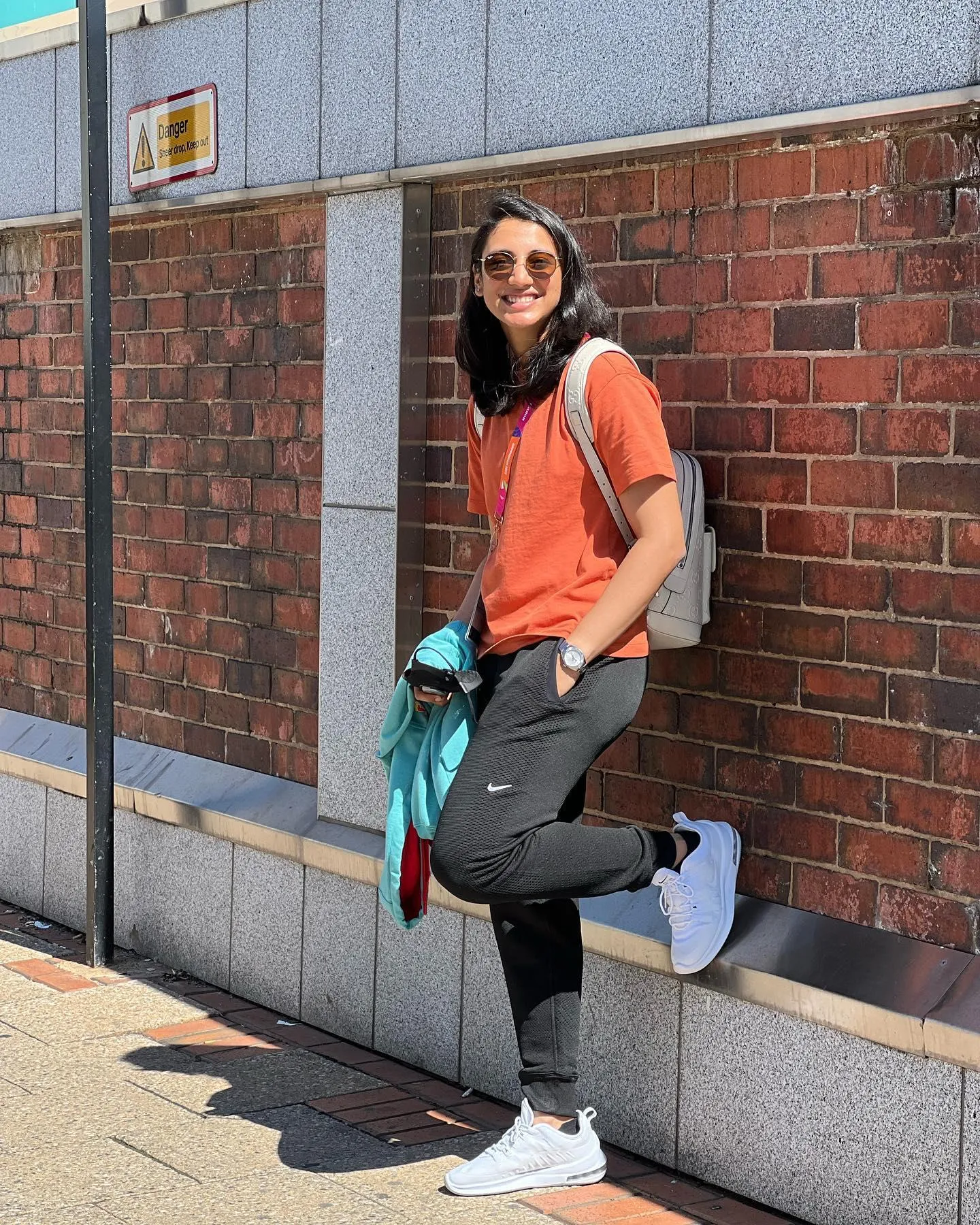 Street style fashion outside urban brick wall wallpaper