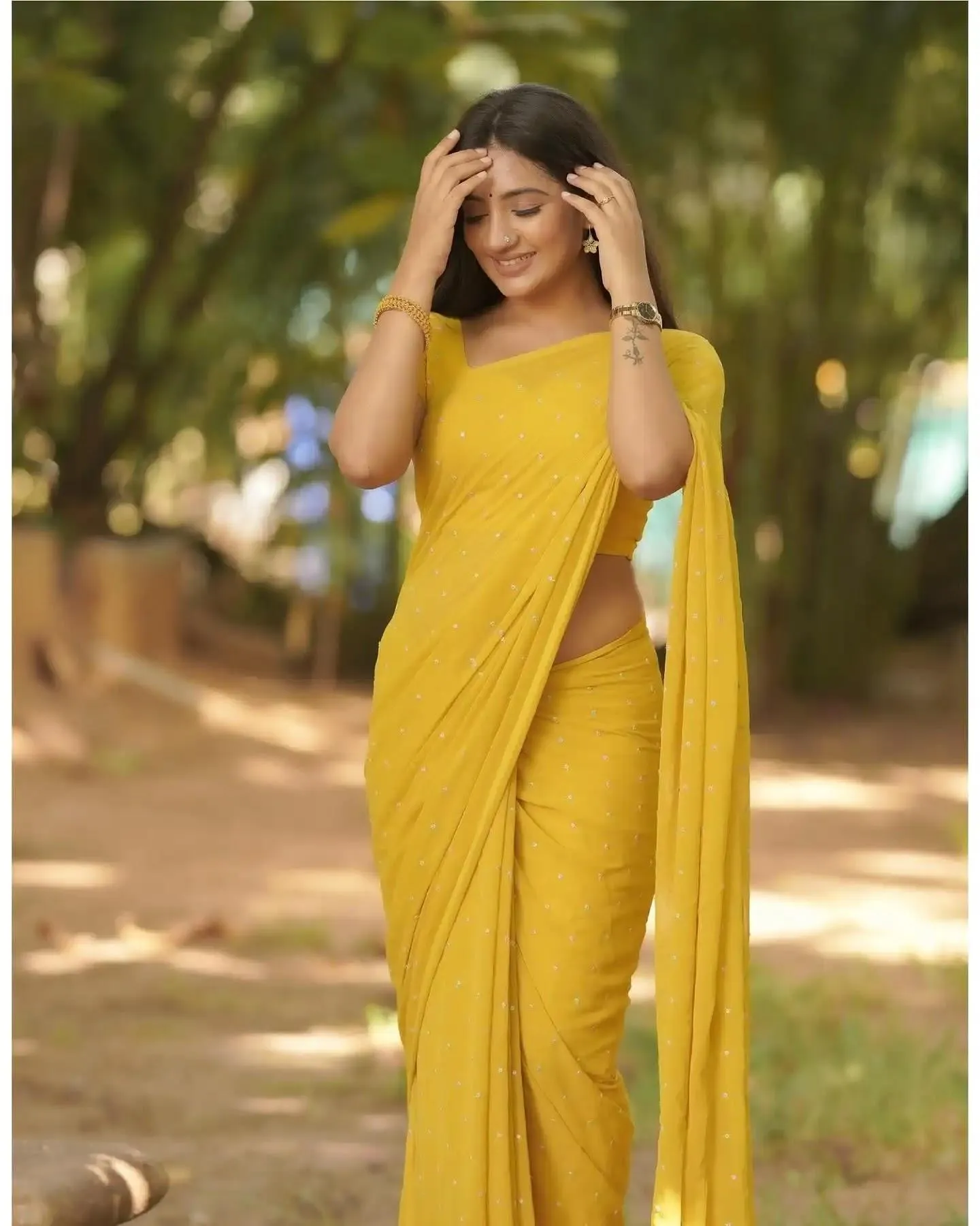 Attractive Hima Bindhu in Yellow Saree Showcasing Style