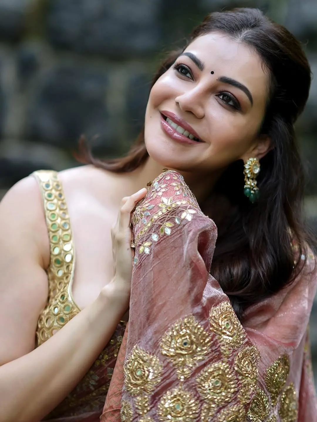 Attractive Kajal Aggarwal in Golden Saree with Beauty