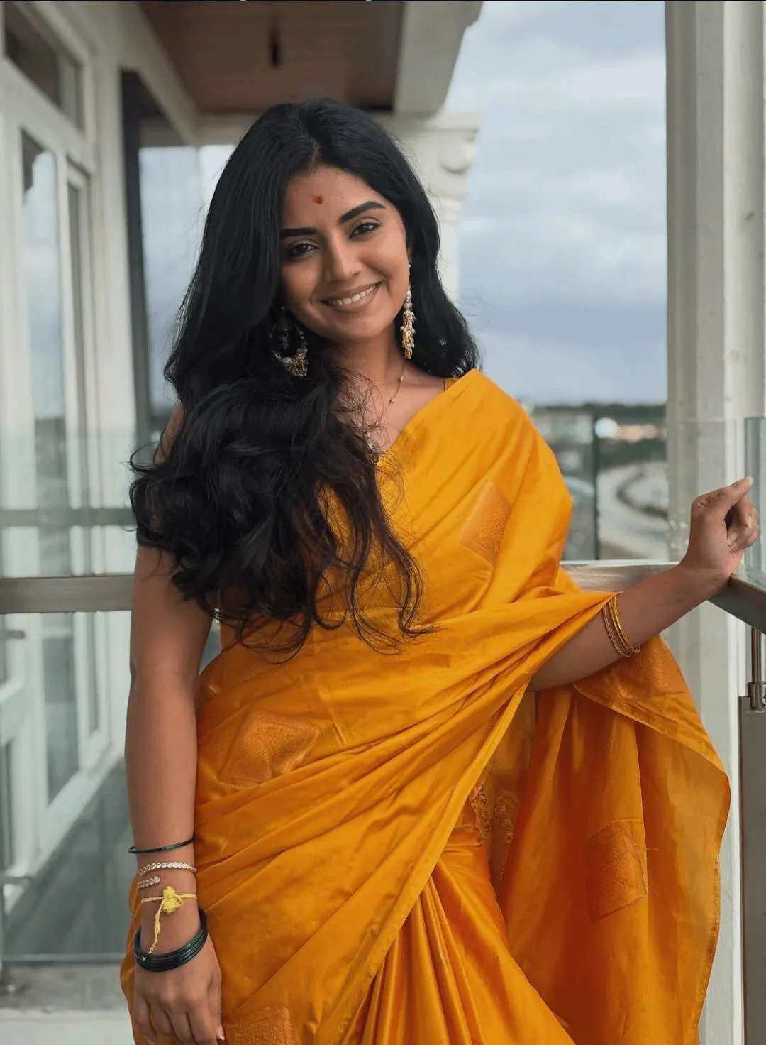 Attractive Megha Shetty Radiant Yellow Look in Saree Picture