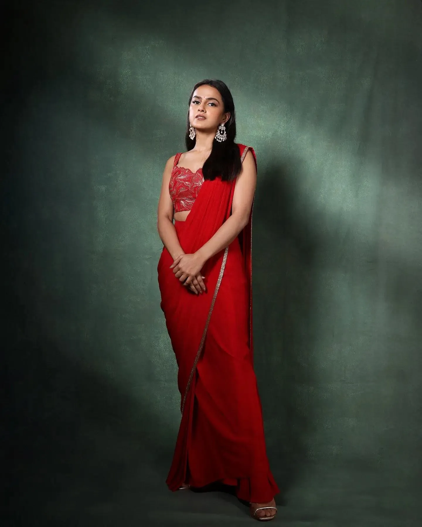 Attractive Shraddha Srinath in Red Saree Portrait Wallpaper