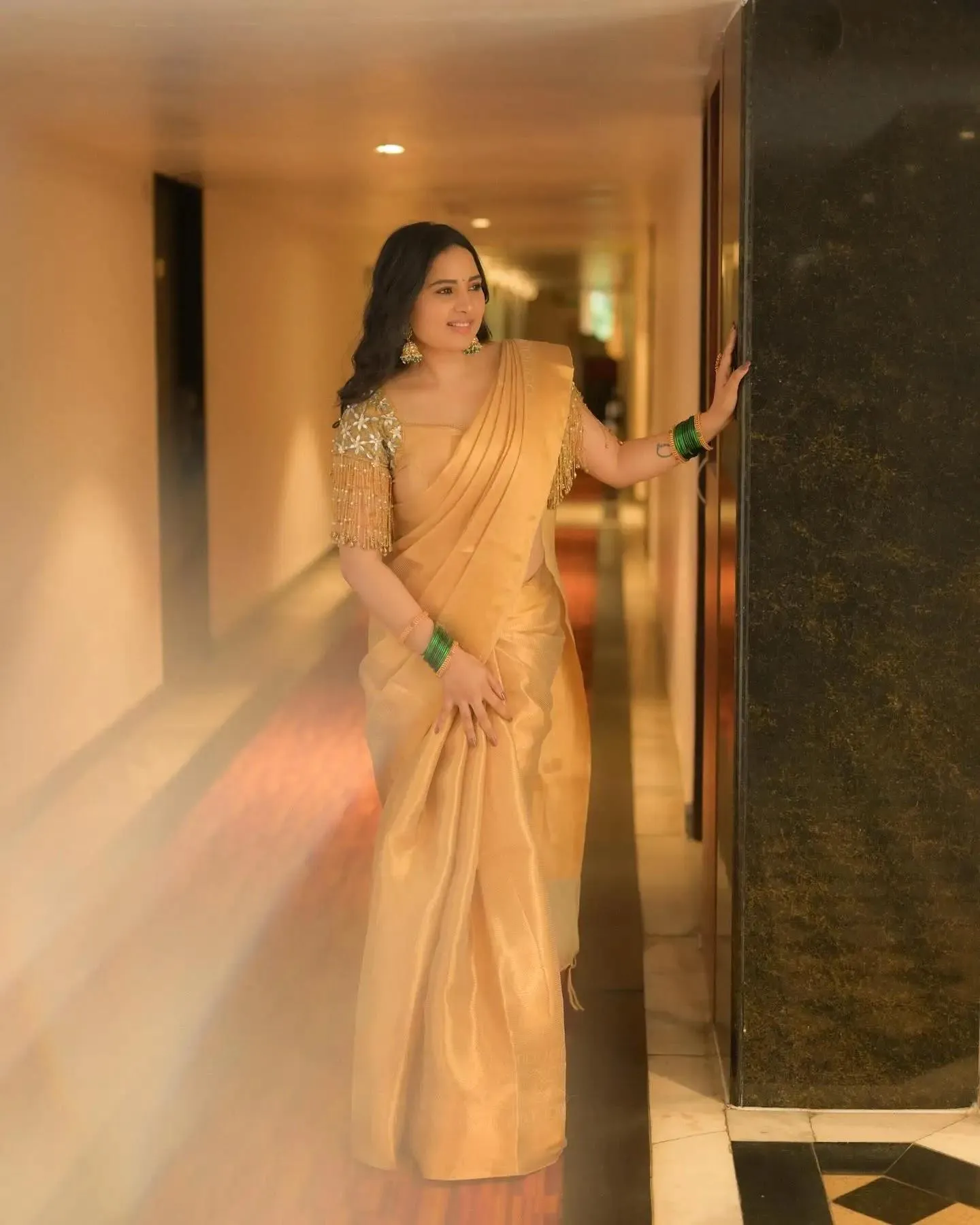 Attractive Srushti Dange in Cream Saree Radiating Elegance