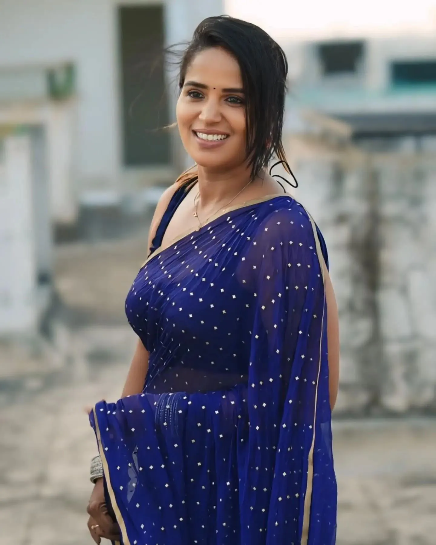 Beautiful Subha Geetha in Royal Blue Saree Pose Wallpaper