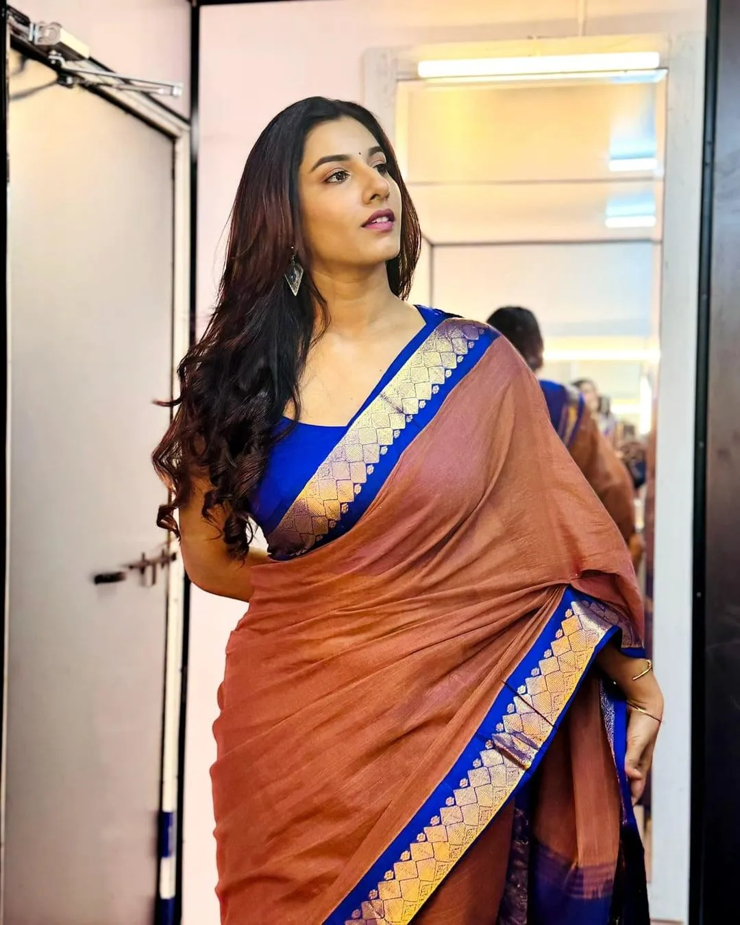 Beautiful Vishnu Priya Bhimeneni in Brown Saree Grace