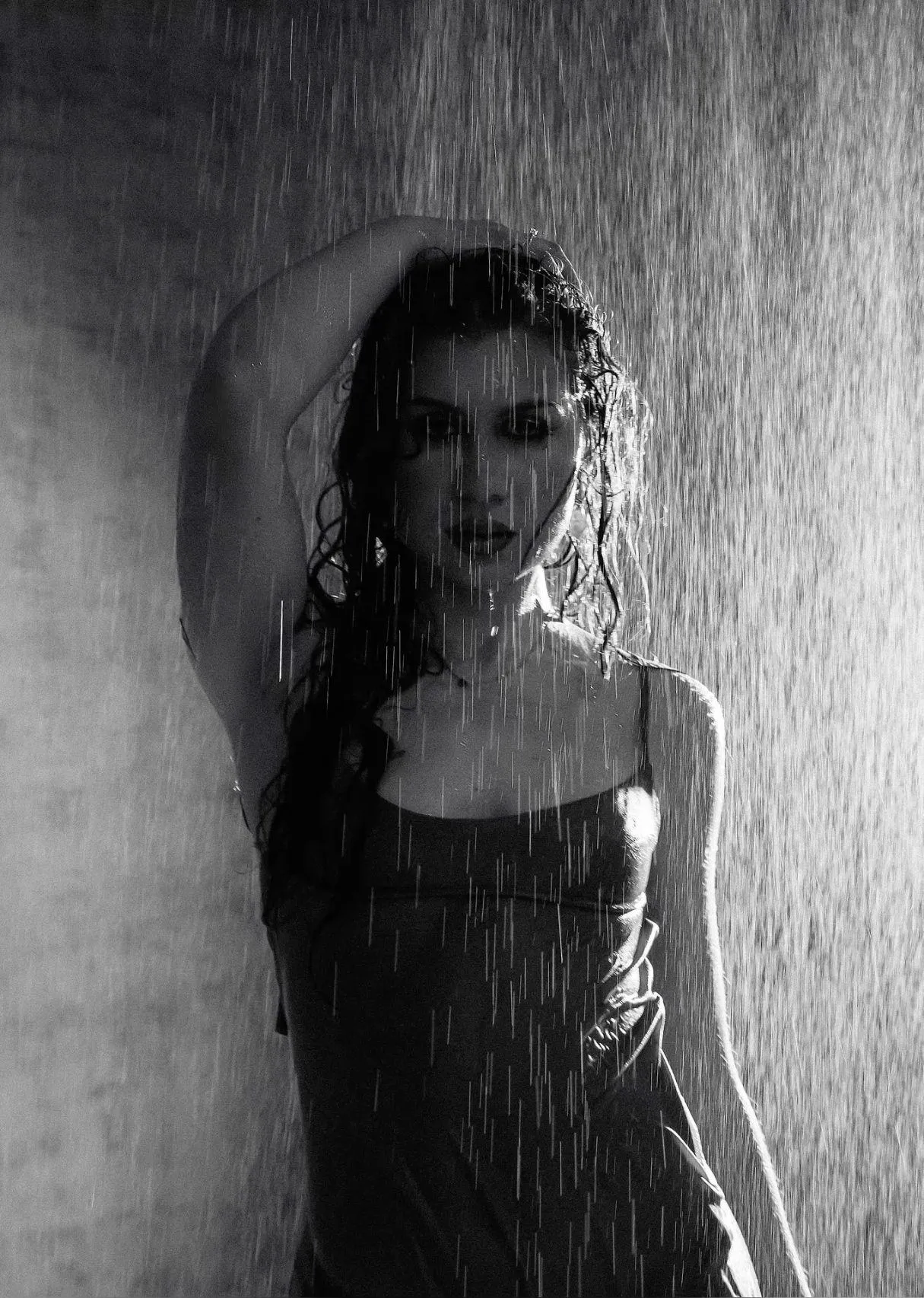 Beautiful Woman Posing with City Lights in the Background