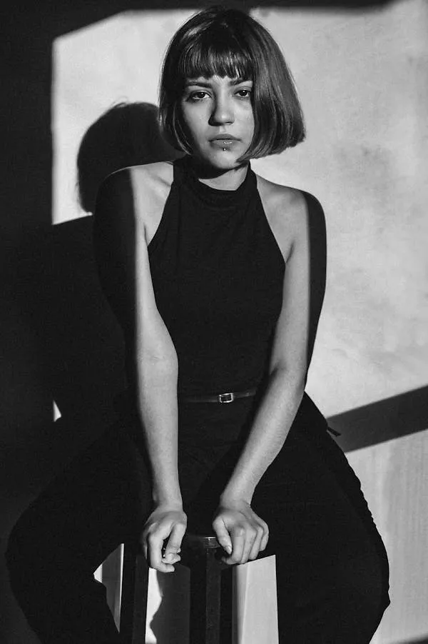 Black and White Fashion Portrait of Woman with Cropped Hair
