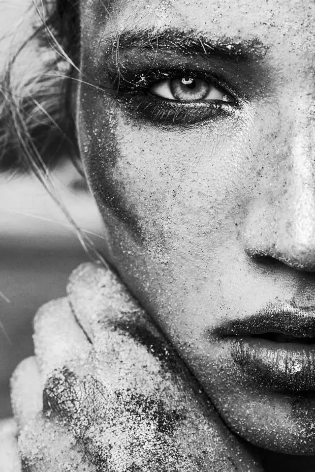 Black and White Portrait of a Woman with Textured Overlay