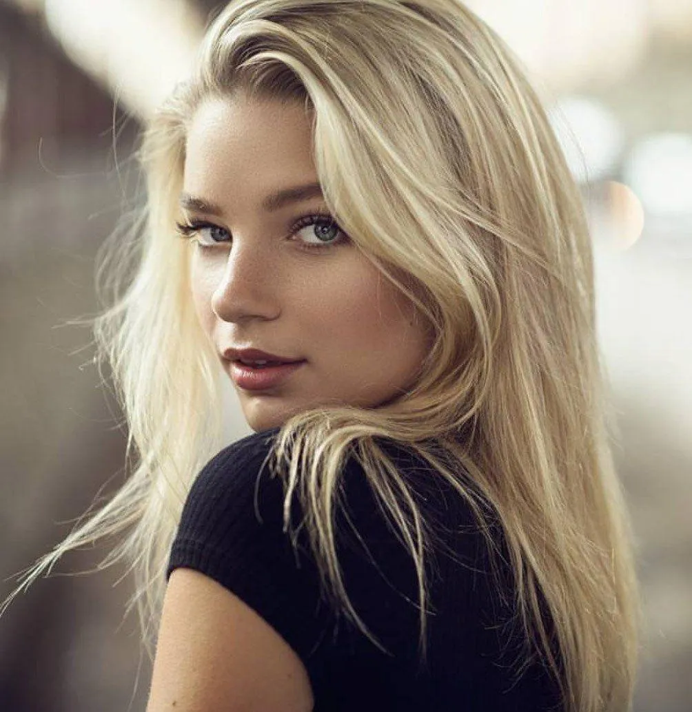 Blonde Woman Looking Over Her Shoulder in Natural Soft Light