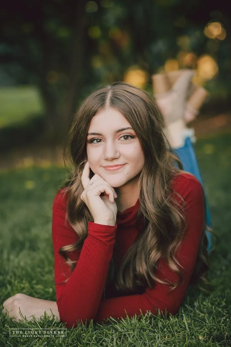 Blonde Woman Riding a White Bicycle in the Open Countryside