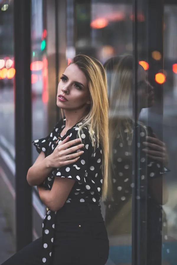 Blonde Woman Standing Near the Glass Wall Free Wallpaper