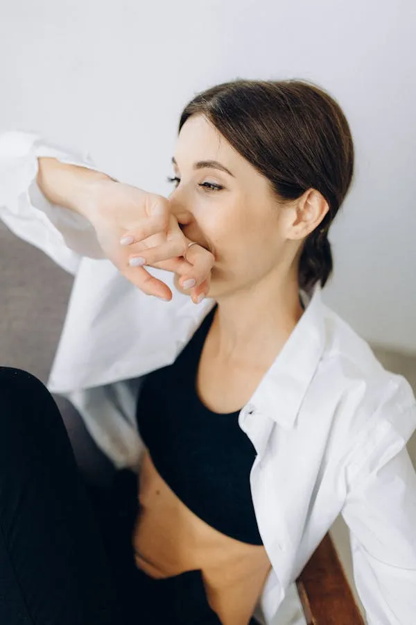 Casual Portrait of a Woman in a Black Top and a White Shirt