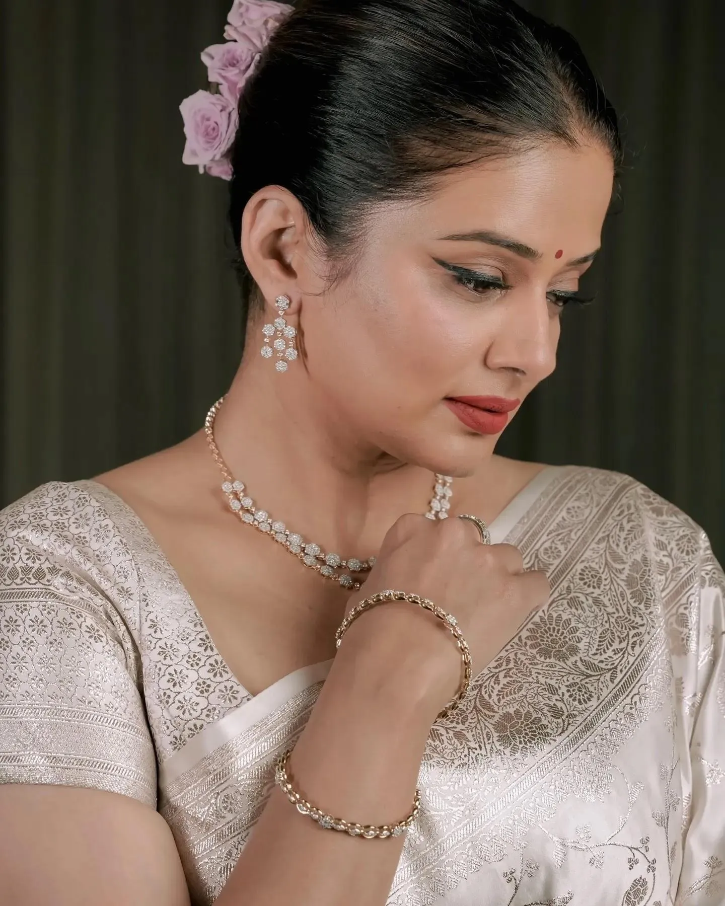 Charming Priyamani in Cream Saree with Graceful Profile